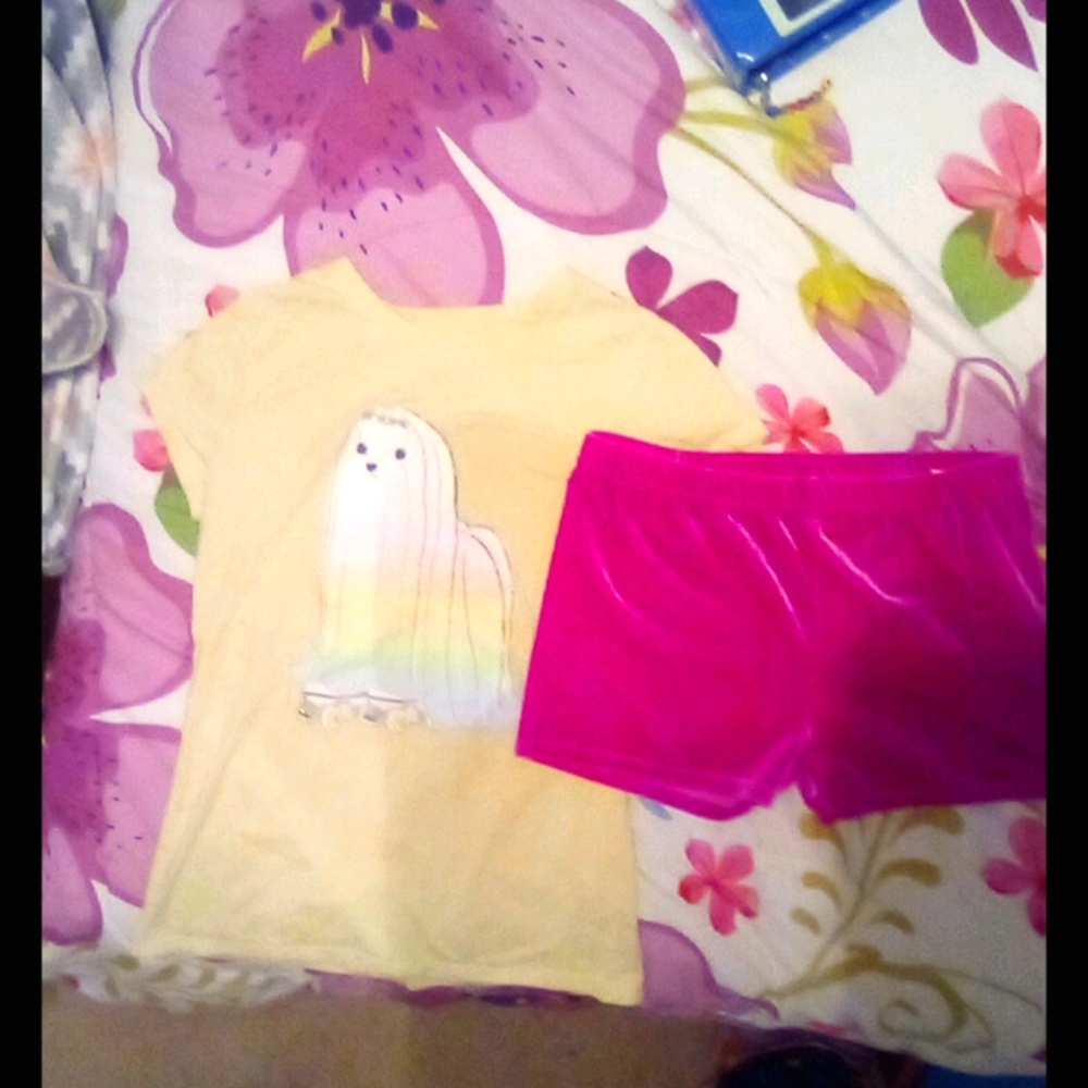 Yellow shirt and pink shorts